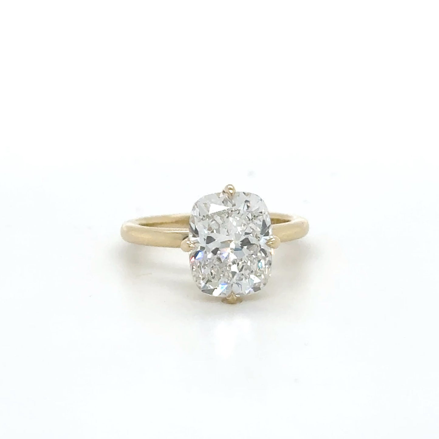 Solitaire Ring NSEW Setting